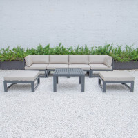 LeisureMod CSTOBL-7BG Chelsea 7-Piece Patio Ottoman Sectional And Coffee Table Set Black Aluminum With Cushions