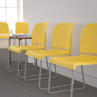 Flash Furniture RUT-238A-YL-GG HERCULES Series 880 lb. Capacity Yellow Full Back Contoured Stack Chair with Gray Powder Coated Sled Base