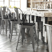 Flash Furniture XU-DG-TP001B-24-PL1B-GG Lincoln 24'' High Clear Coated Indoor Counter Height Stool with Back and Black Poly Resin Wood Seat