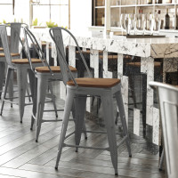 Flash Furniture XU-DG-TP001B-24-PL1T-GG Lincoln 24'' High Clear Coated Indoor Counter Height Stool with Back and Teak Poly Resin Wood Seat